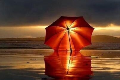 orange umbrella beach1